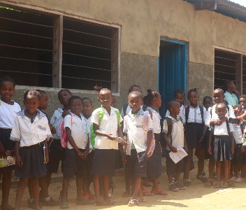 La Tendresse students gathered outside their classroom buildings